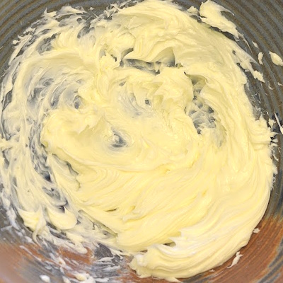 Cream the butter for the Buttercream Icing Recipe.