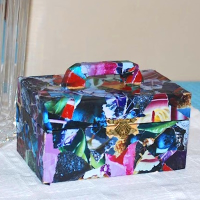 Decoupage a box with magazine pieces